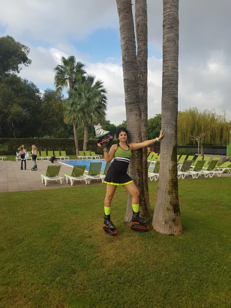 Veronica with Kangoo Jumps in a park in Barcelona