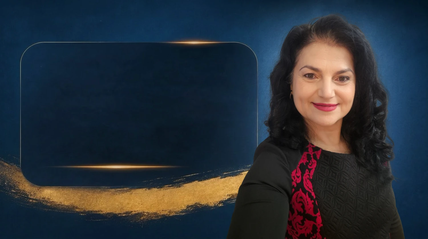 Veronica in front of a gold frame on a navy background